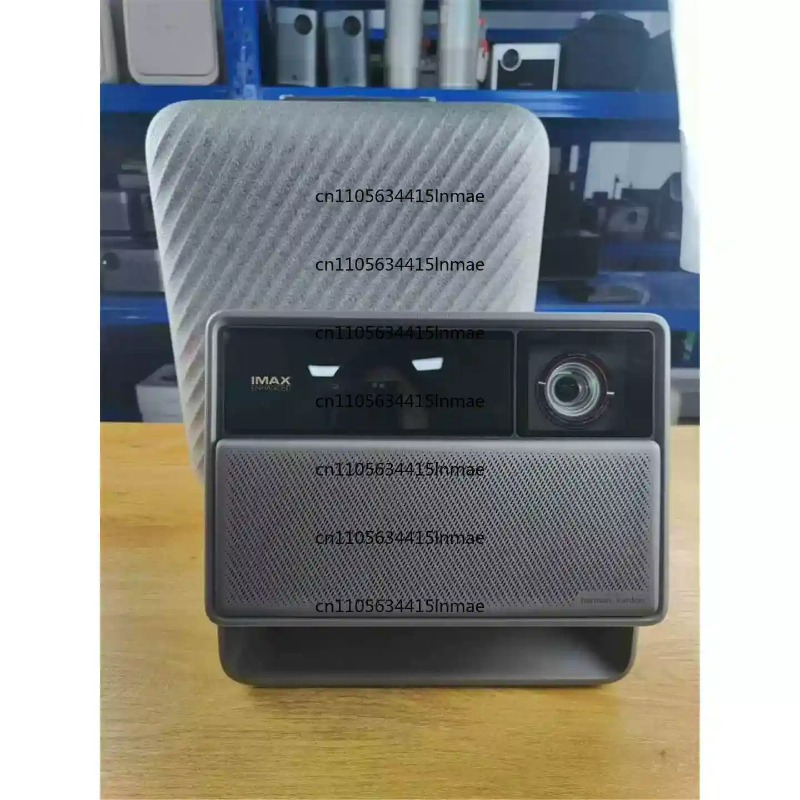جهاز عرض ليزر ثلاثي الألوان DL - مراجعة Home Cinema Laser Projector وسعره
